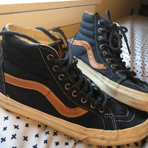 Navy blue and brown Vans Sk8 Hi
